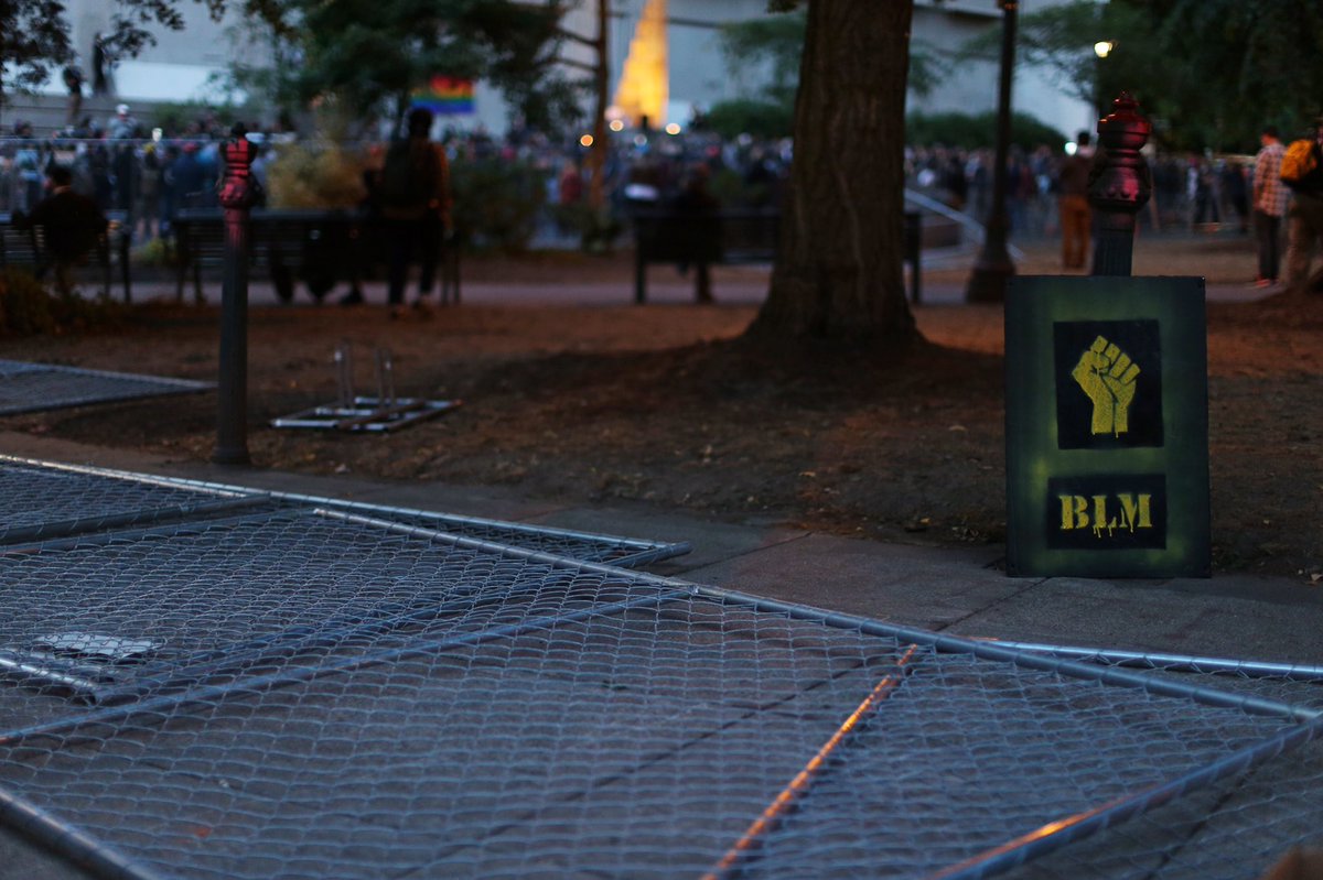 The fencing around Chapman and Lownsdale squares that was initially set up yesterday has been torn down