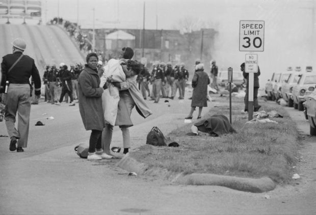 Williams & Lewis stood their ground peacefully & prayed. The troops advanced & charged. Then the beatings, the tear gas & the terror began. Uniformed aggressors struck out at men, women & children or chased them down on horseback. The marchers did not fight back. It was barbarous