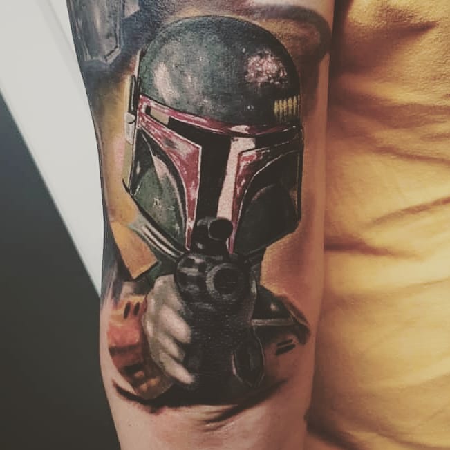 L1amThompson's tweet photo. #NationalTattooDay one of my growing collection of #StarWars tattoos. Few more to go and my sleeve will be complete #Darksiders #BobaFett https://t.co/YglLCiL7ED