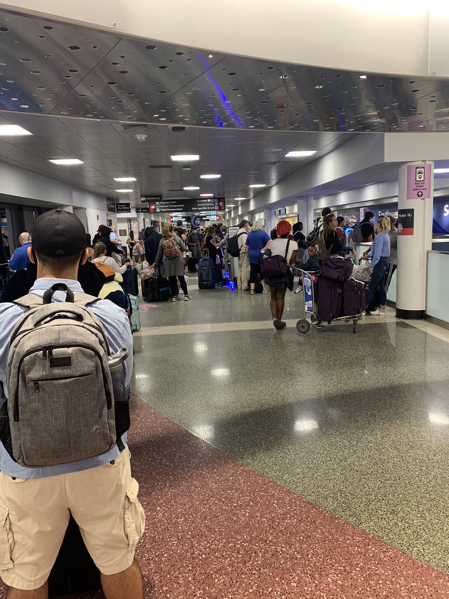 Leo_Joseph18's tweet photo. @SouthwestAir bag drop pre pandemic ghost town. **during pandemic complete cluster no one 6 feet apart no markings about social distancing on the ground no hand sanitizer to be found. Bring on the rona I guess? @BostonLogan https://t.co/Qqor2B5aLo