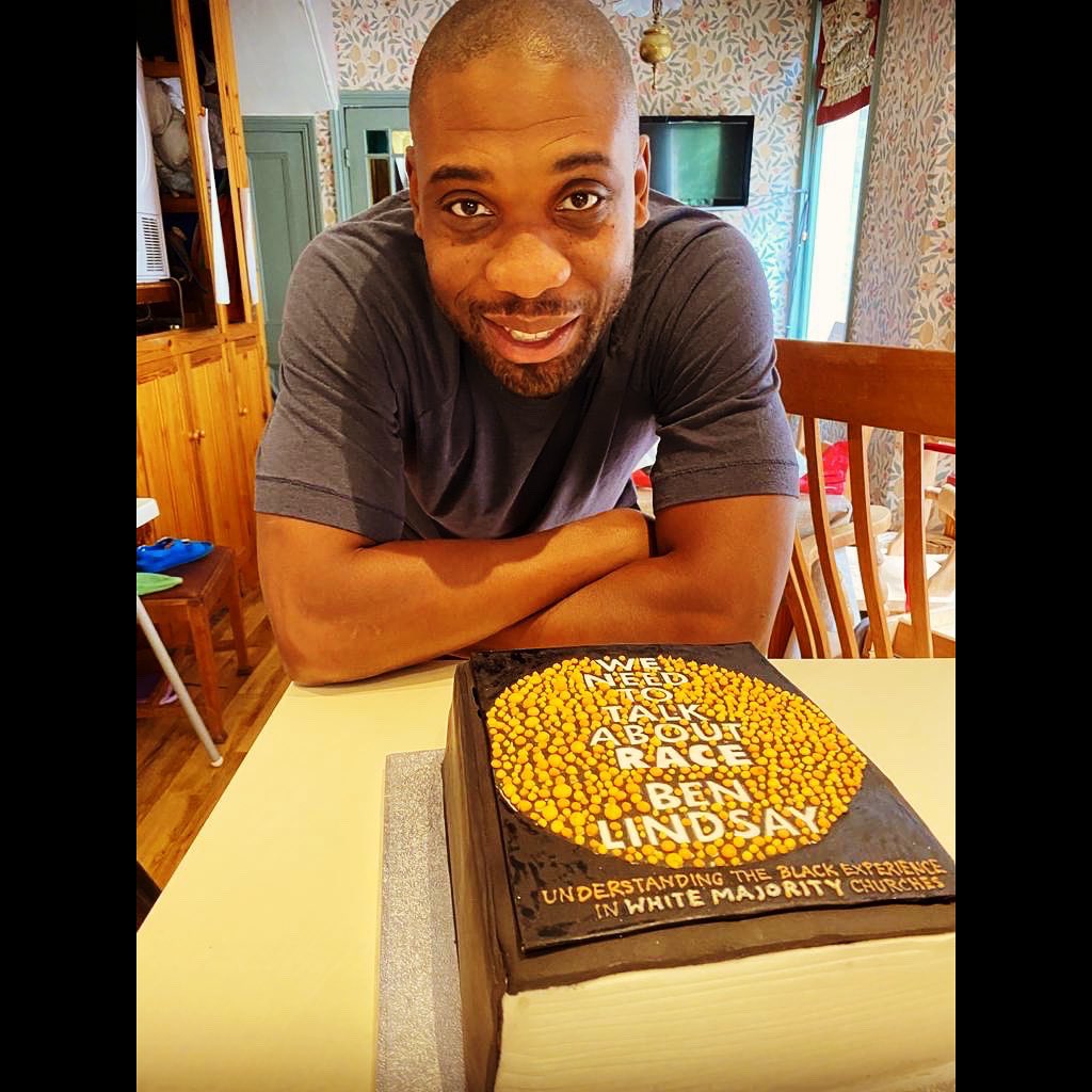 benlindsayOBE's tweet photo. A year ago today #WeNeedToTalkAboutRace was released. Celebrating it’s 1st Anniversary and being number 1 for a second week in a row on @Nielsenbook top 50 Religious Books 🤯 Thanking God for this opportunity and thanks to all who have purchased and supported the book. Cake time! https://t.co/kz3z0JyXgD