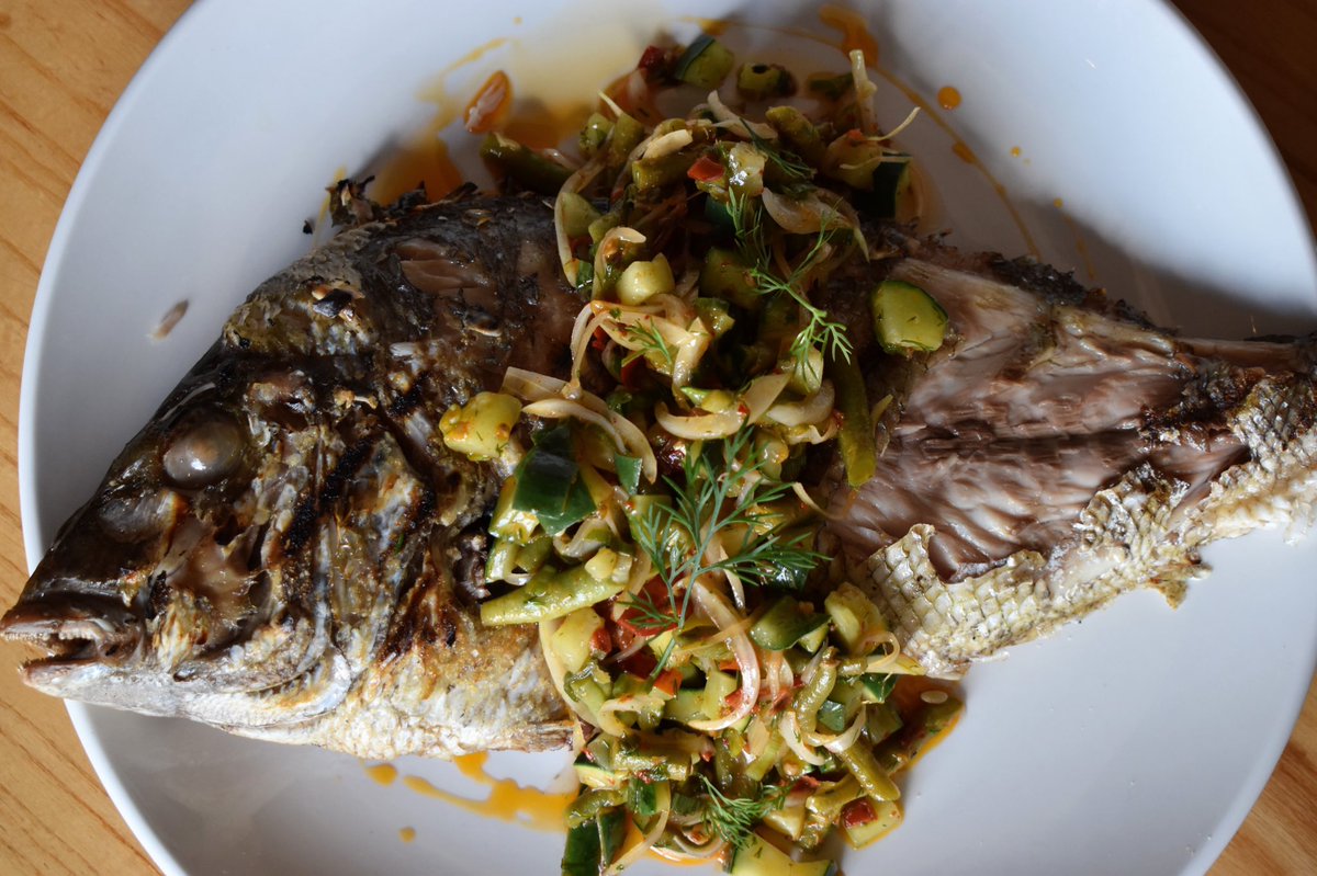 Edgeinpeoria's tweet photo. “sometimes some things are ugly-beautiful” - Chef Dustin Allen

pictured below is our whole grilled porgy with a dill, cucumber, lavender, and green bean salad 

📸: @carboy_2001 https://t.co/e7xYMs4Sg1