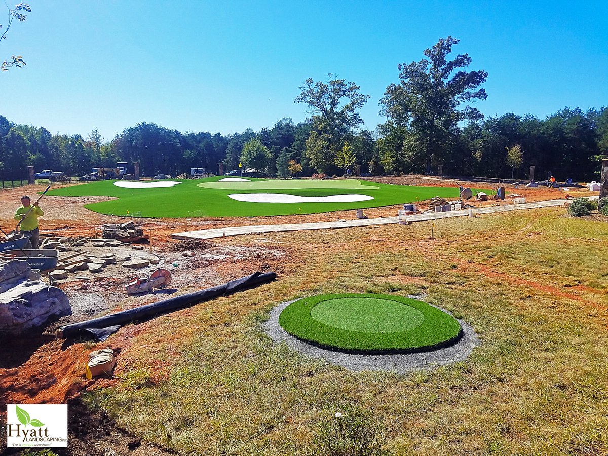 HyattLandscping's tweet photo. Working on our golf game. #hyattlandscaping #golfcourse #turfinstallation #landscaper #hardscapeproject #greenery #customlandscaping https://t.co/HjVLAm3pU7