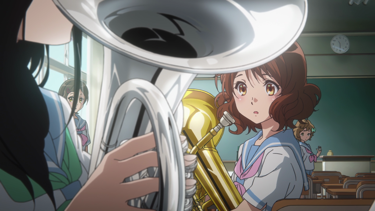 During this episode there's a lot of box imagery since Kumiko's desire to improve makes her feel confined. She's scrunched between two euphoniums, being squished by Asuka when she plays the part better than her, even framed in front of a square window.