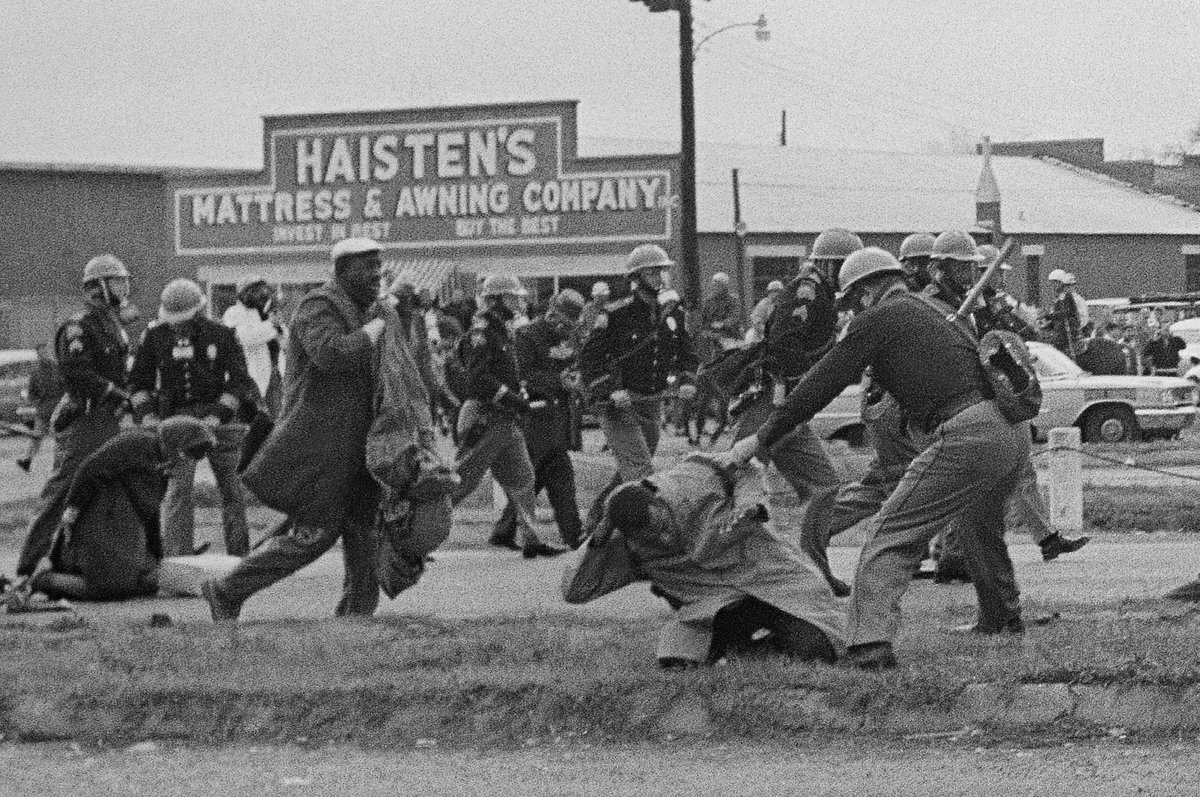 John Lewis beaten by an Alabama state trooper in Selma, Alabama on March 7, 1965. Photo credit: AP.  #JohnLewisRIP