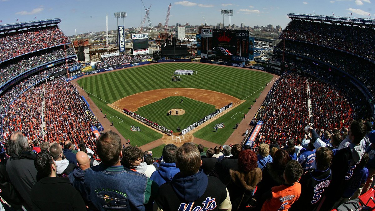 The field? It was so green! The stands were a bright blue & orange. The stadium? Impressive. It seemed unsafe! The stands looked as if they went vertical as they went up. Almost as if—should one lose their footing at the top — they might fall straight onto that very green field!