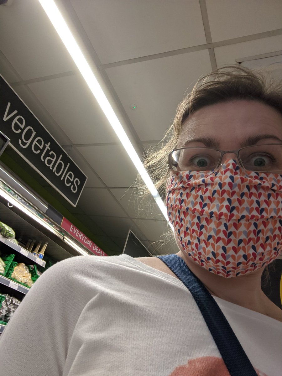 emmy_c's tweet photo. I really love my mask! I'm still getting used to wearing it though. Here's me wearing it in the local co-op and doing some seriously scary eyes 😂 https://t.co/Uso3JzE9UG