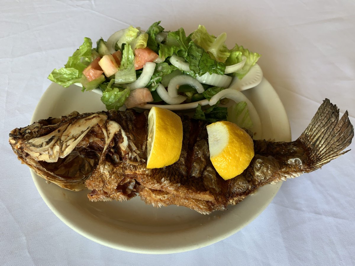 Meazarestaurant's tweet photo. Meaza's whole fish is a whole fish served with your choice of rice or salad. https://t.co/pIh5Ybn90Z https://t.co/dZc9lbG0Eb