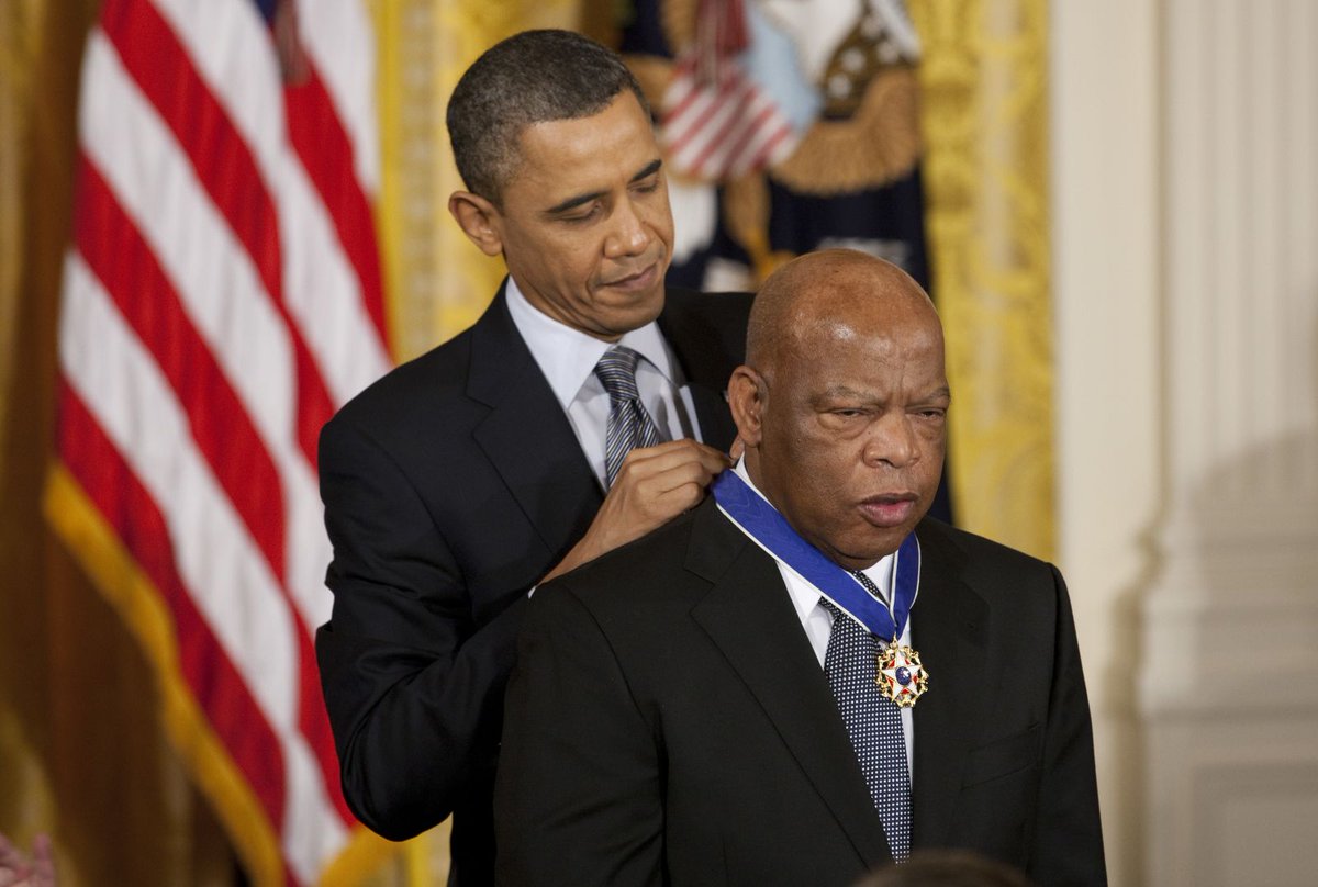 President Barack Obama awards John Lewis the Presidential Medal of Freedom in 2011. Photo by Brooks Kraft.  #JohnLewisRIP