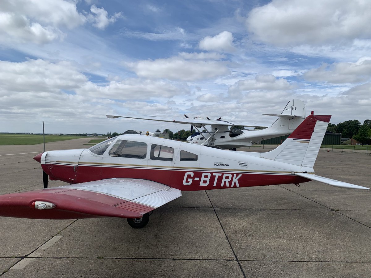 Justin_Br0nk's tweet photo. Fantastic bit of flying today, but the Piper Warrior I fly from my club at Stapleford looked more than a little outclassed at the airfield I visited! Thanks @IWMDuxford for a great ATC service and reception! #GAflying https://t.co/ceMBjgZDey