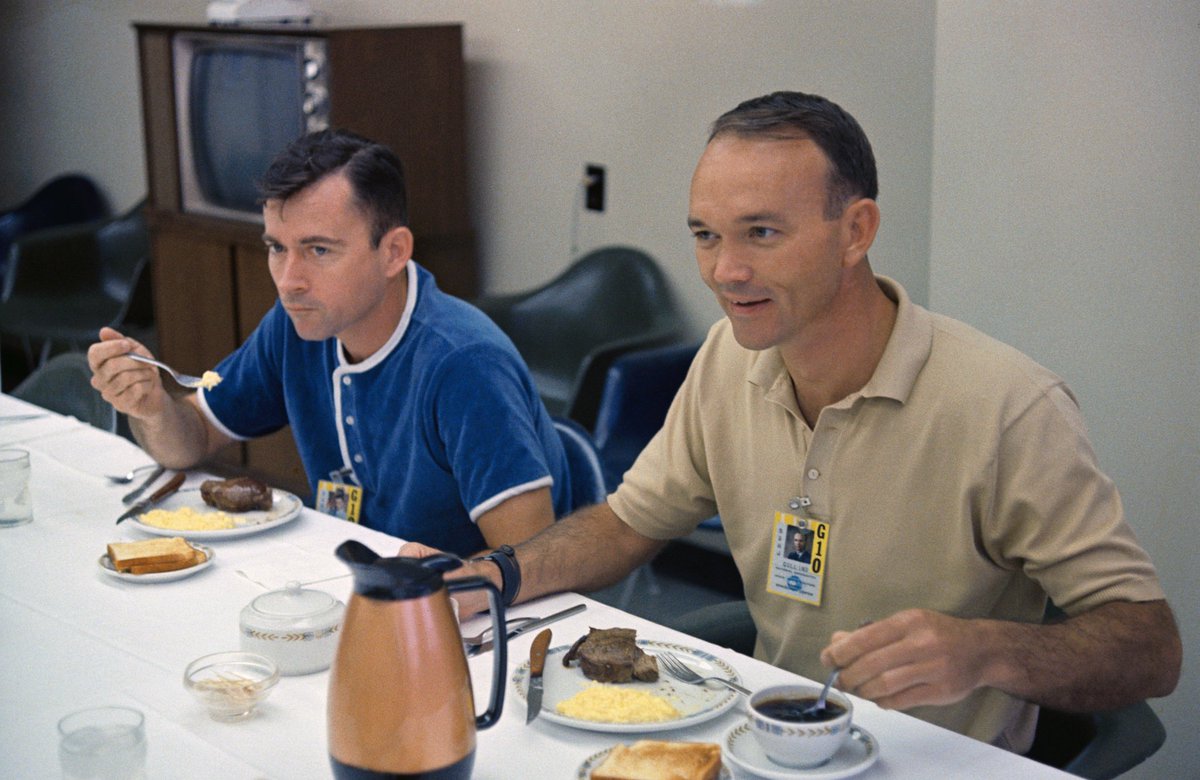 This mission was the eighth crewed launch of a Gemini capsule. The plan for the three-day mission had the astronauts performing rendezvous & dockings. Young & Collins are pictured here eating the traditional launch day breakfast.