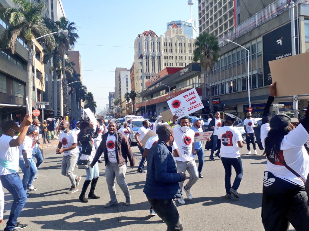 Mfundoyakhe_S's tweet photo. BREAKING NEWS: Unemployed Graduates of South Africa Marched the Streets of Durban demading government to employ &amp; #PutSouthAfricansFirst among the March were unemployed Doctors, Teachers, Social Workers &amp; others. RT.

#SACitizensMustCome1st #MandelaDay  Andile 
#CloseTheGraves https://t.co/1b8xuYpixN