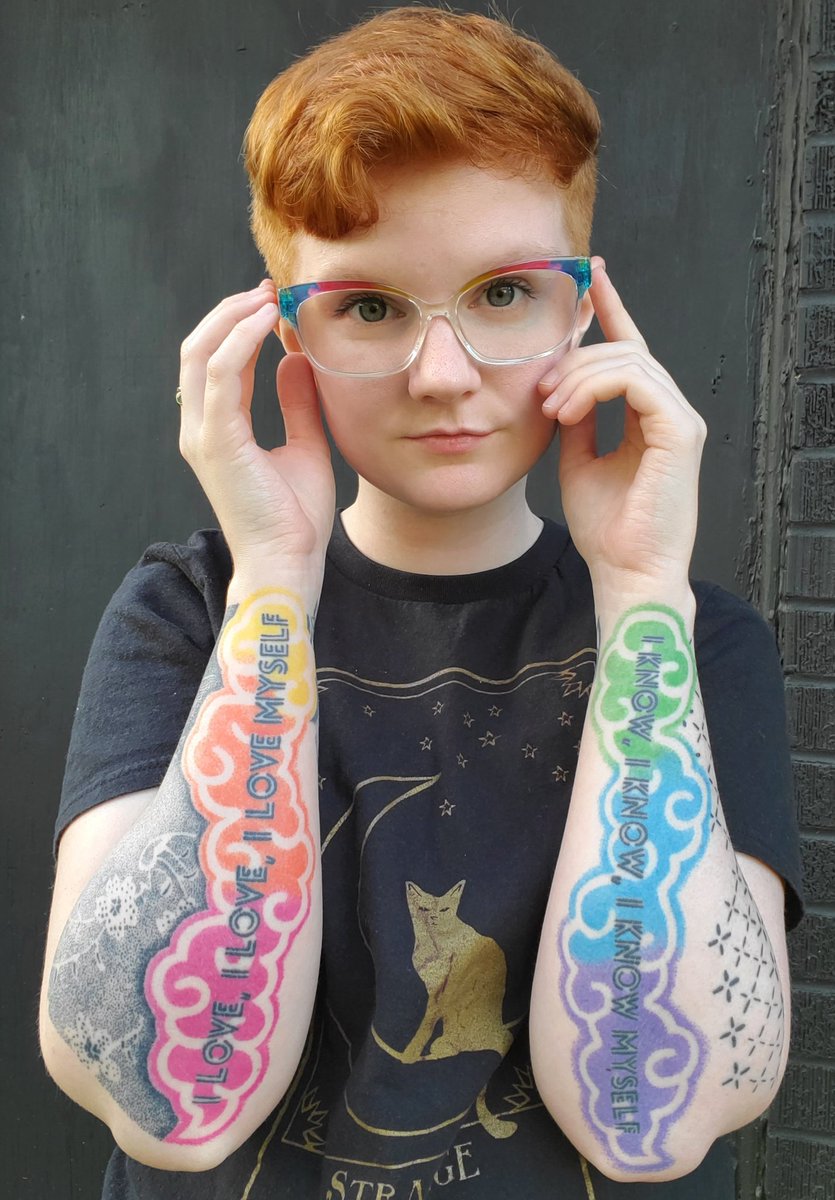 Slowpoke_Megan's tweet photo. I can't attend a Kpop related festival without showing off my most prized Kpop possession; my rainbow BTS tattoos. Lyrics from Cypher Pt. 4, font from the Love Yourself Trilogy, tattooed by my parents.  #KPSNPODCASTFEST @KpopSocialNight https://t.co/fm9iuSniOg