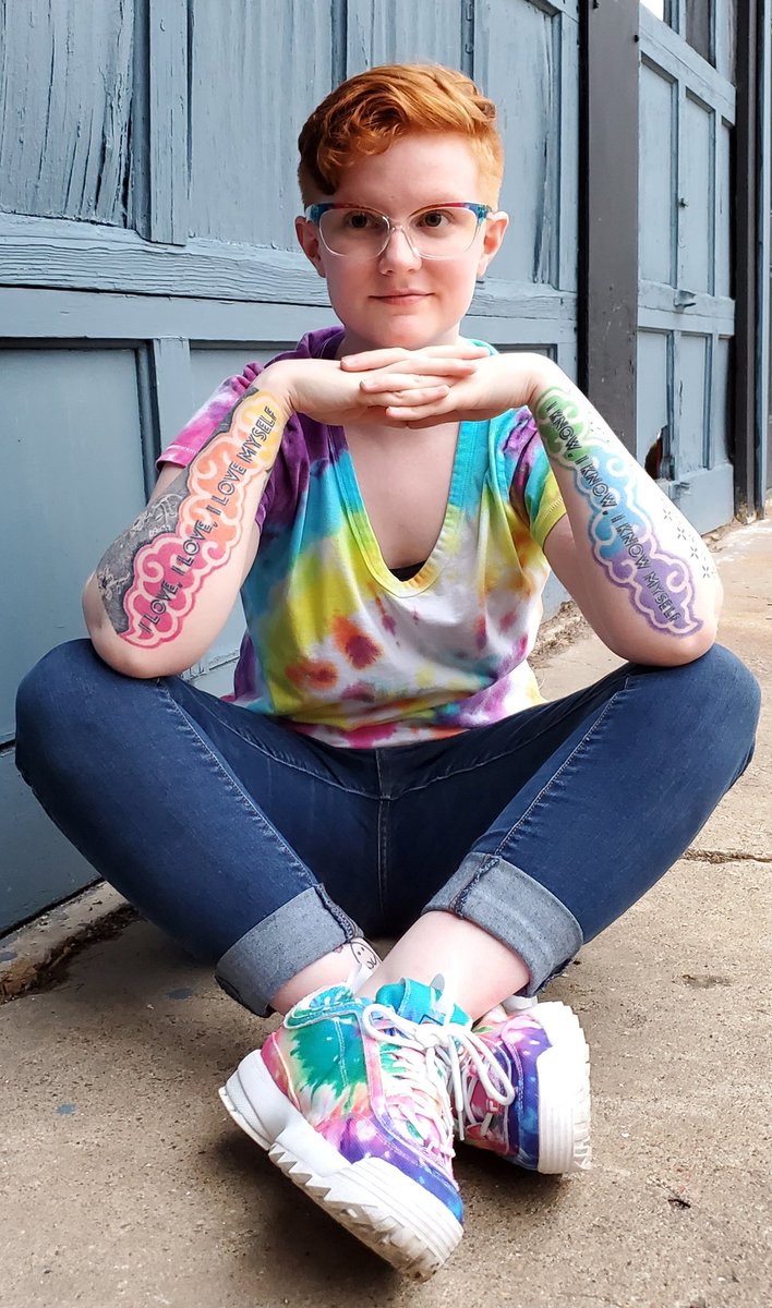 Slowpoke_Megan's tweet photo. I can't attend a Kpop related festival without showing off my most prized Kpop possession; my rainbow BTS tattoos. Lyrics from Cypher Pt. 4, font from the Love Yourself Trilogy, tattooed by my parents.  #KPSNPODCASTFEST @KpopSocialNight https://t.co/fm9iuSniOg