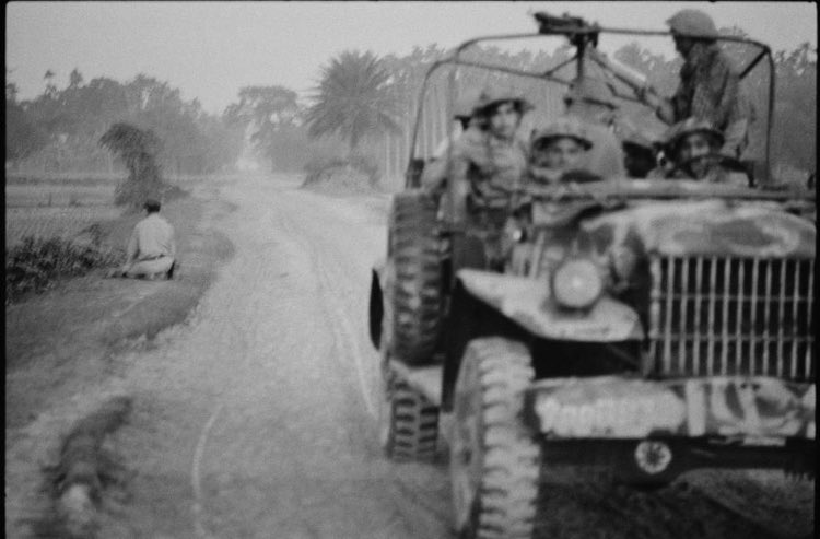 EAST PAKISTAN. Between Rangpur and Bogra. At dawn, an armed convoy of Pakistani troops makes a halt for the Bigadier to perform his fajr prayers. (The convoy is in territory occupied by the Indian Army).(17/20)