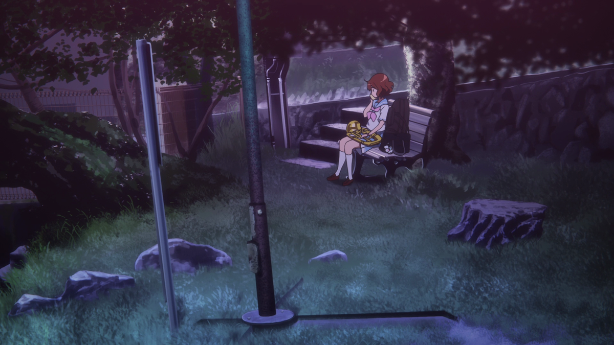 The choice of blues is astounding and only amplifies the melancholic mood. There's also the placement of the tree which creates a roof over Kumiko, a roof that Kumiko is trying hard to reach beyond with her skills. This is similar to the grass imagery from before.