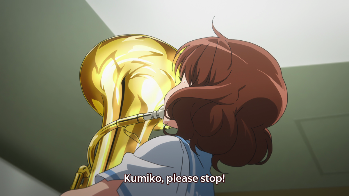 While at home, Kumiko grows increasingly frustrated which is amplified by the close-up shot. There's also the low shot angled up at Kumiko, with Kumiko being confined by a table and bed, showing how Kumiko feels more empowered at this moment despite the boundaries.