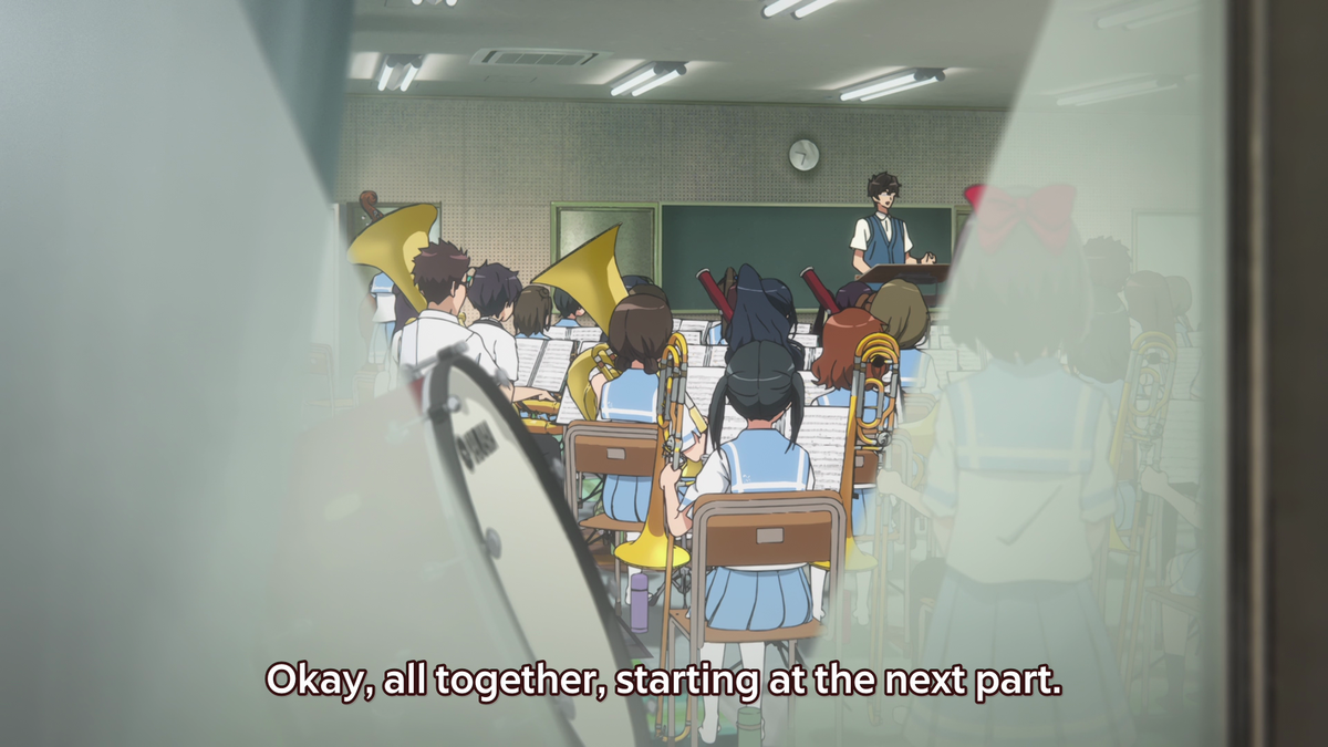 The sweat here is great because it only furthermore shows the audience Kumiko's fiery passion and determination. There's also the window shot which, once again, reinforces that good ol' box imagery!