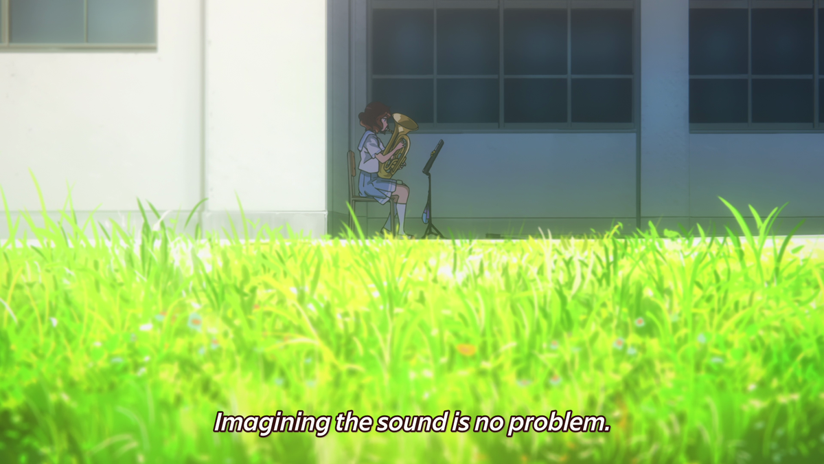 Grass overtakes the screen, the desire for growth is becoming overwhelming, but this emphasis on grass is also pushing Kumiko upwards in the frame which also reflects the pressure building as she's trying to improve her skills.