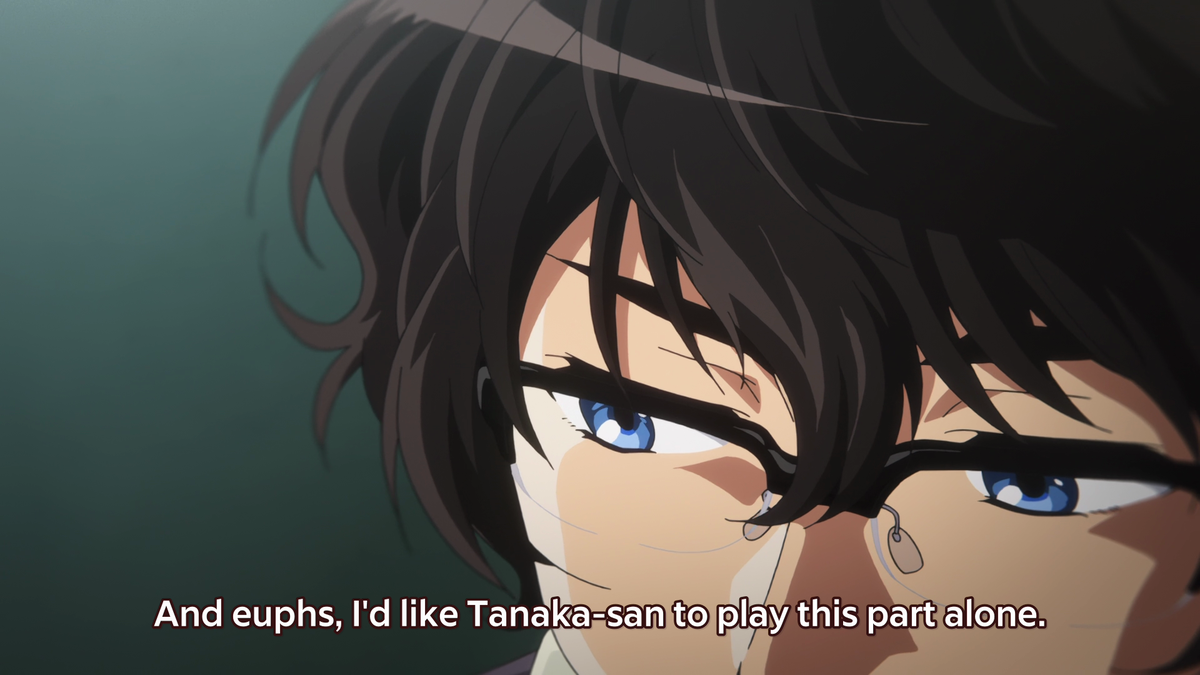 Kumiko being confined between Asuka and her euphonium shows how Kumiko still isn't up to par with the others. Taki takes note of this and asks Asuka to play the part alone.