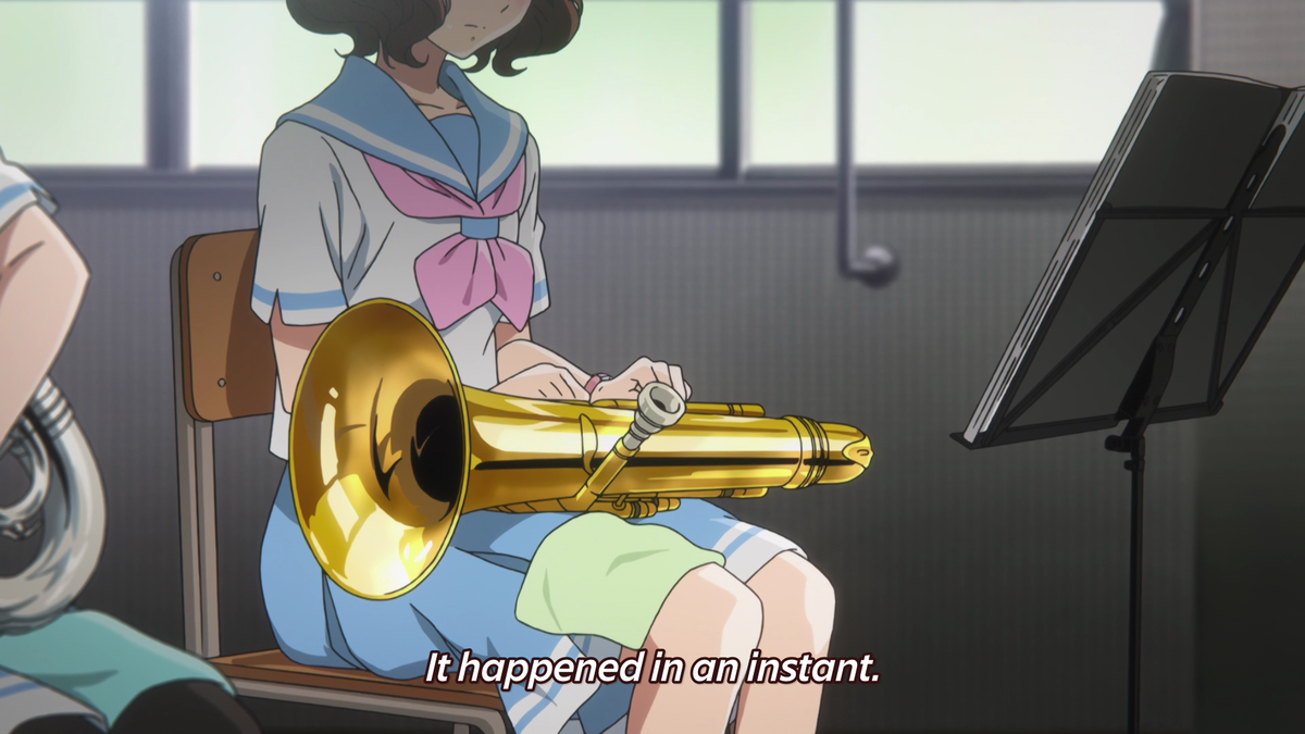 The lighting on Kumiko's face is darkened, reflecting how she feels distraught. Her face is then lit up upon further realization that everyone is entirely serious about making it to the Nationals, and sees herself as dead weight because her playing was holding the band back.