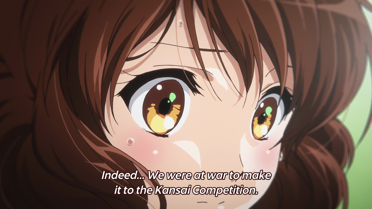 The lighting on Kumiko's face is darkened, reflecting how she feels distraught. Her face is then lit up upon further realization that everyone is entirely serious about making it to the Nationals, and sees herself as dead weight because her playing was holding the band back.