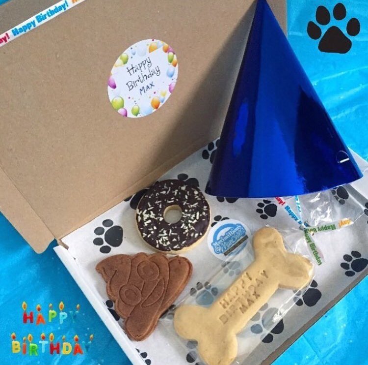 Our birthday 🎉 boxes are designed to fit through your letterbox 📮 Which means cheap postage and no need to wait in if you need to go out. These contain a personalised peanut butter bone, a coconut &amp; carob donut, a Carob emoji poo 💩 biscuit and a party hat in a paw print box 🐾