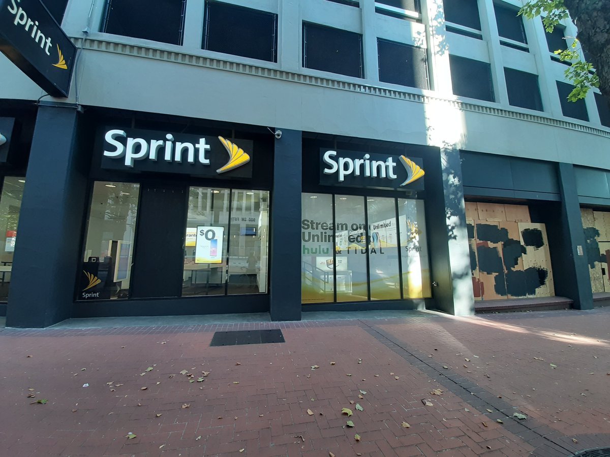 The  @sprint store had been broken into at some point in the last 50 days of protests. Broken glass was visible all over the store.
