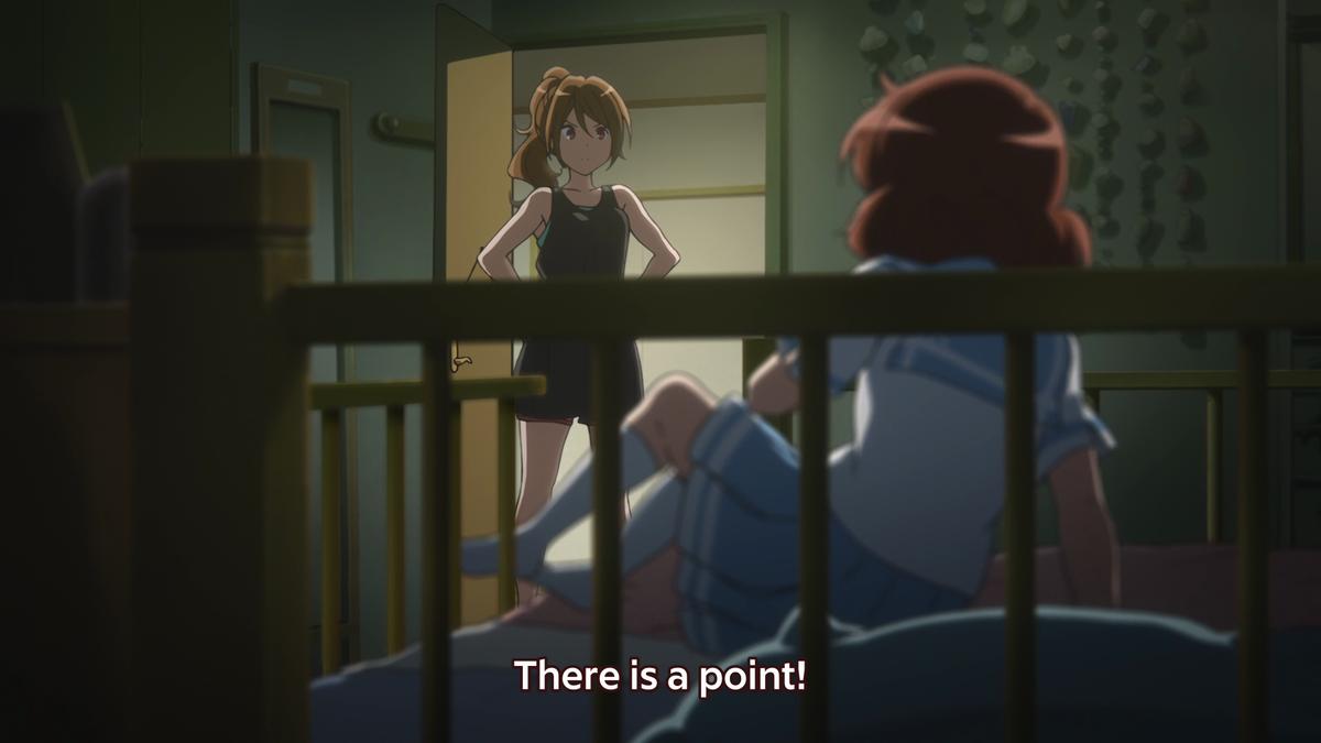 This is the moment where Kumiko breaks free from the boxes and prisons we've seen throughout the entirety of the episode. She confronts her sister and the visuals show her head moving above the bars as she admits her love for the euphonium!