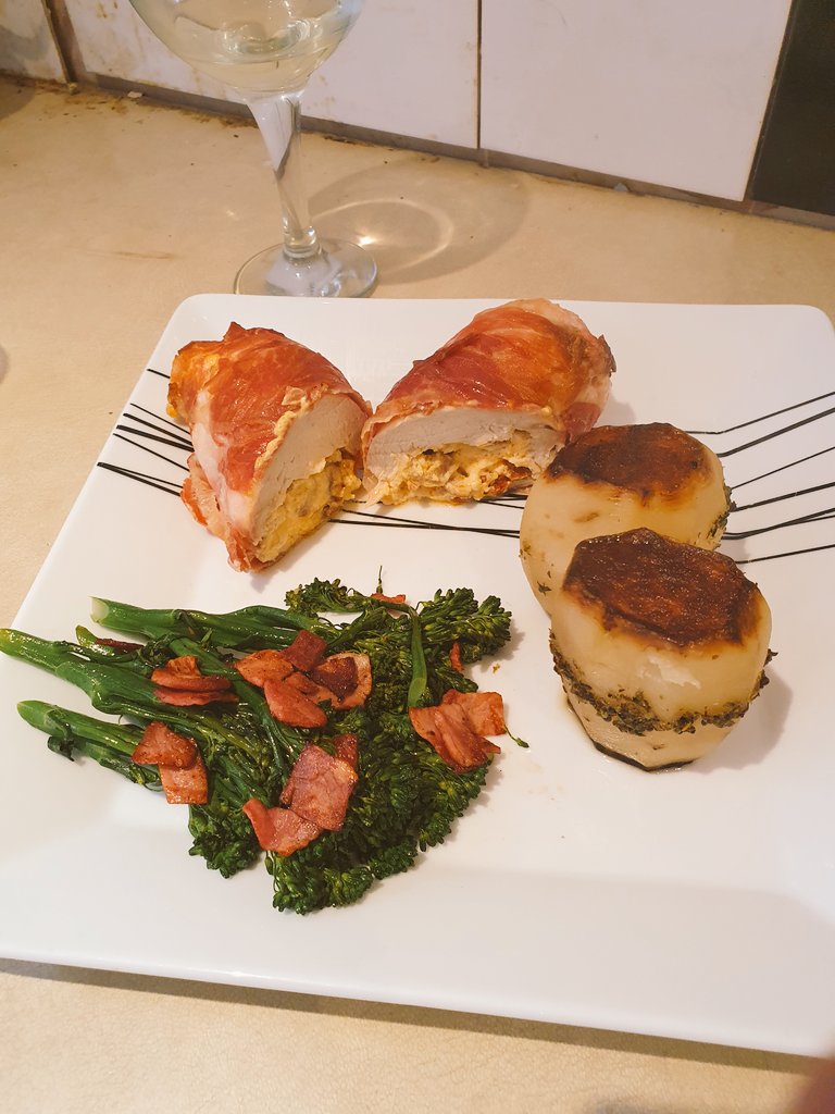 Paulhomersham's tweet photo. This month's offering. 
Ballotine of chicken stuffed with cream cheese and Chorizo wrapped in parma ham. Served with pomme fondant and tender stem broccoli with crispy ham said the in voice of Janice from @sortedfood #DisasterChefJuly https://t.co/CAKFV7BWy2