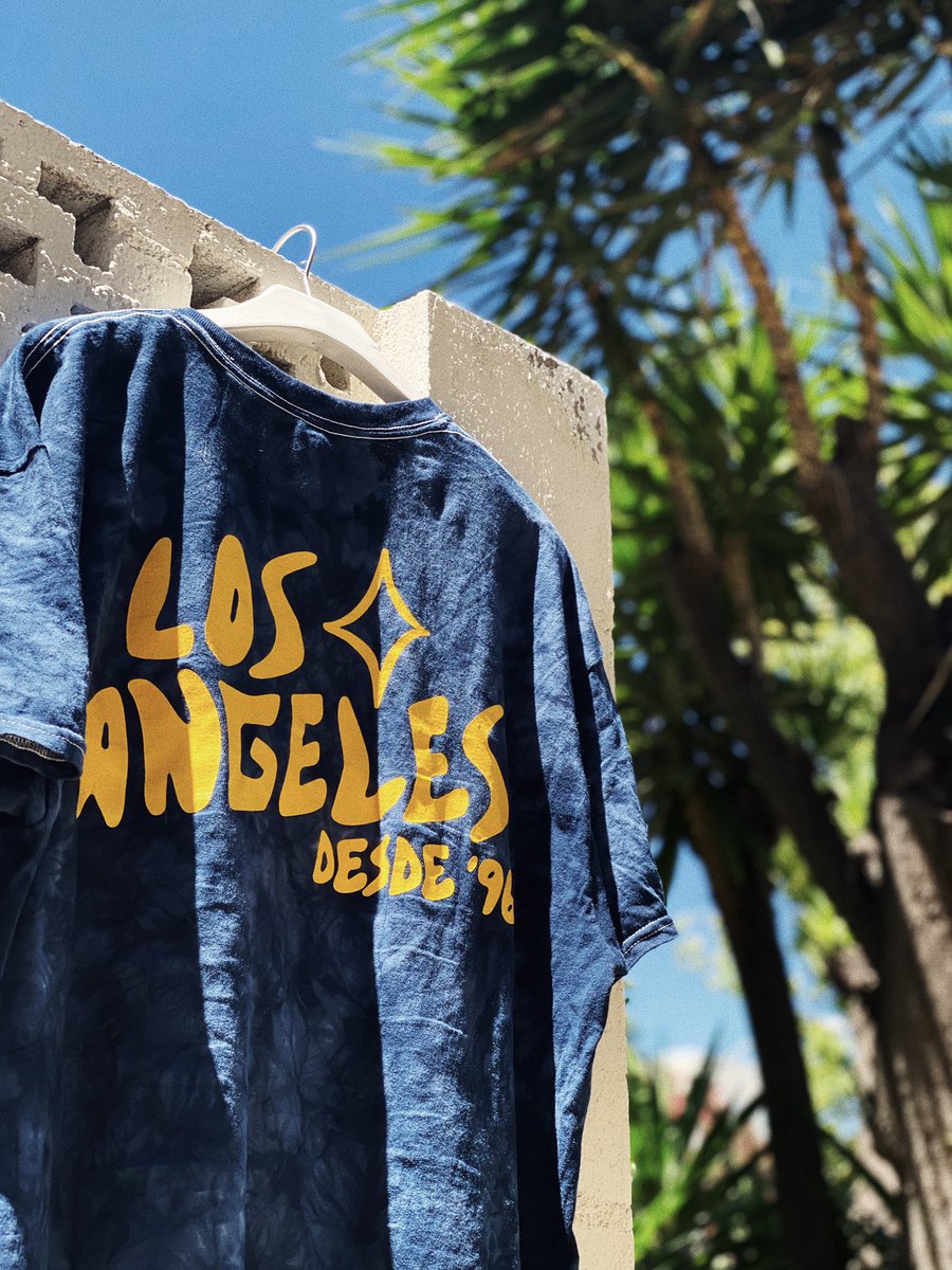 ThisisCRLS's tweet photo. It’s been out for a while but wanted to share my collab with @onetwothreads honored to be able to put out something for the club that I love. @LAGalaxy it’s game day....let’s get it! https://t.co/Xj1VuxvOih
