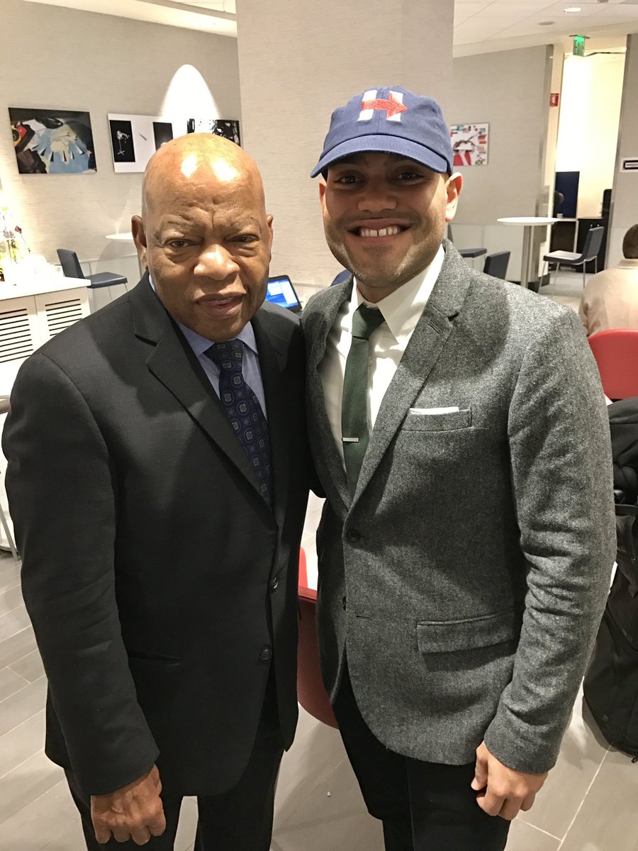 prgomez's tweet photo. I’m waiting at the @delta sky club and I see @repjohnlewis from the corner of my eye. Then this moment happened. He complimented me on the hat and said: “These guys want to take us back, but we won’t let them do that. We need to speak up everytime we see something’s not right.” https://t.co/rND5TKTJL9