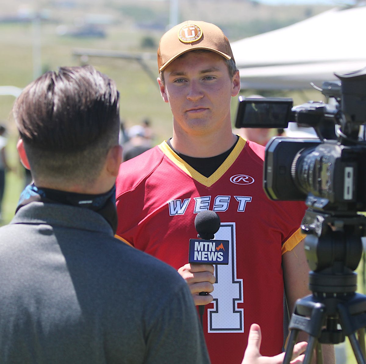 Foles74's tweet photo. Here is @DomTibbettsKXLF and his legendary head of hair interviewing former Butte Central quarterback Thomas McGree. https://t.co/kc73ZvxkQT