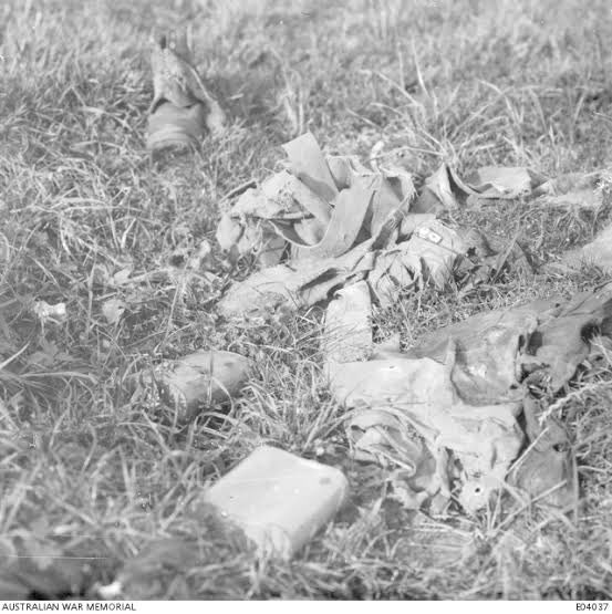 Australian kit is strewn across the battlefield in 1918, more than 2 1/2 years after the battle.