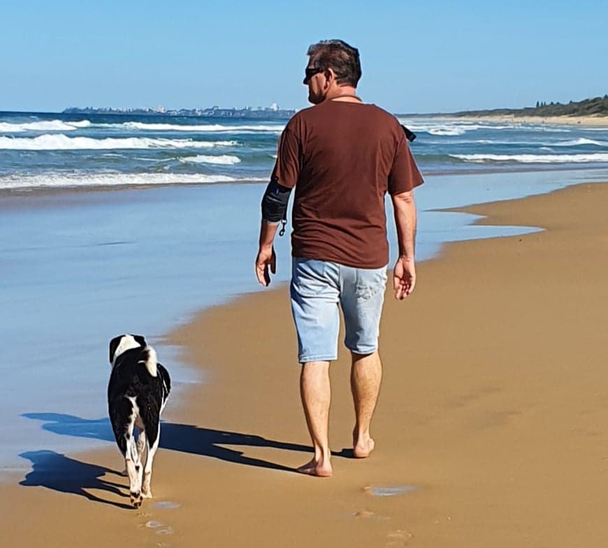 Digital_P3T3R's tweet photo. A walk on along the beach on a winter's day #sunshinecoast #queensland #amanandhisdog #jedi #rescuedog https://t.co/R1Whxg5zSV