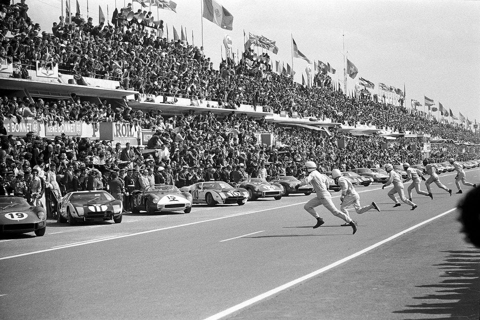 Along the way, Porsche ran a 2.2L and a 3.0L to 2nd and 3rd. Separately... Le Mans had a tradition where drivers stood on one side of the track, and ran across the track to get into their cars at the start of the race. It was not universally popular. Britain had outlawed the