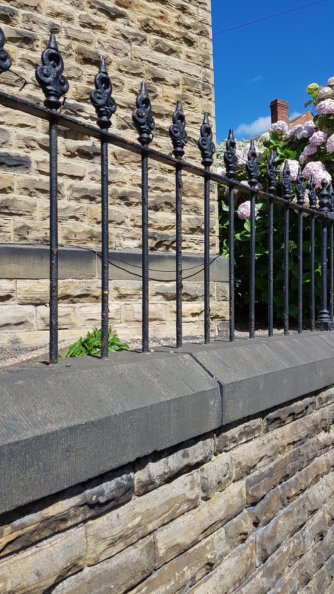 a couple more pics of unchopped original iron railings, this time with a bit of blue sky