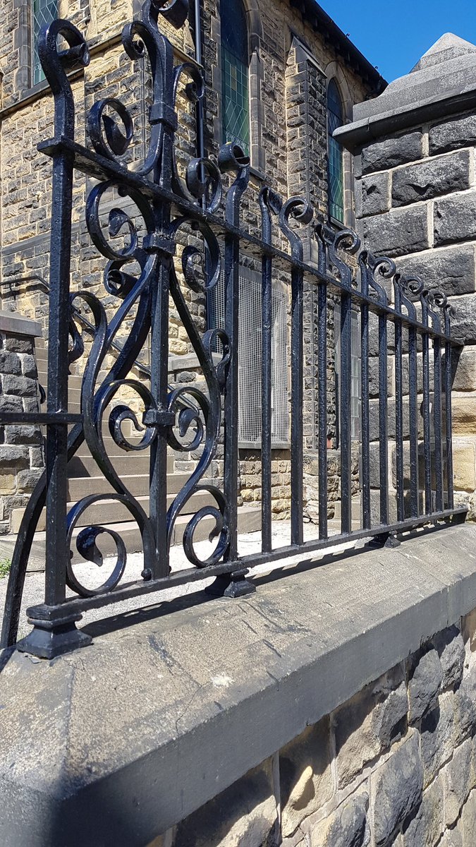 a couple more pics of unchopped original iron railings, this time with a bit of blue sky