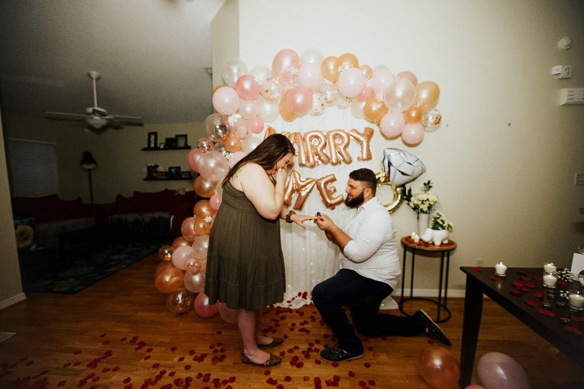 RobbyBourne's tweet photo. So some personal news. She said yes!!! Eventhough, I originally proposed with a ring pop. @captain_cyd https://t.co/cGWlYWfOhU