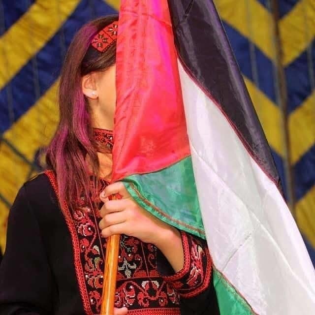 PressTV's tweet photo. This girl is crying. But why?

She is one of the best students in #Gaza and is about to be awarded. Her father's name is going to be honored at the ceremony, but he is not there. He is one of Israel's atrocity victims. 

Now she's hiding her tears behind the flag.

#FreePalestine https://t.co/5A58kZc1GI
