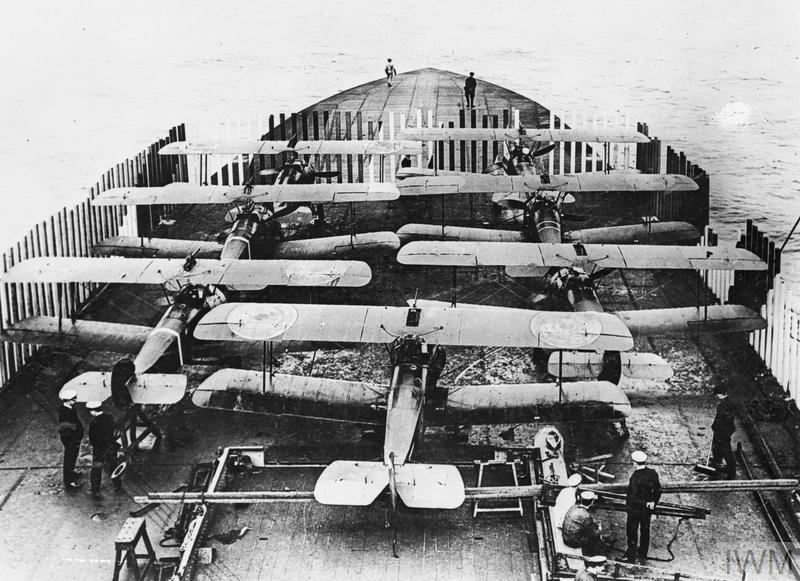 ThisDayInWWI's tweet photo. July 19 1918 UK Aircraft Carrier #HMSFurious launches 7 planes to attack Tondern Imperial German Navy airship base, destroying Zeppelins L 54 and L 60. History's 1st air attack by land planes launching from aircraft carrier 
IWM Q 47940, IWM Q 20627
Jul 19
https://t.co/qBPnXxEF0w https://t.co/oWZupizhXB