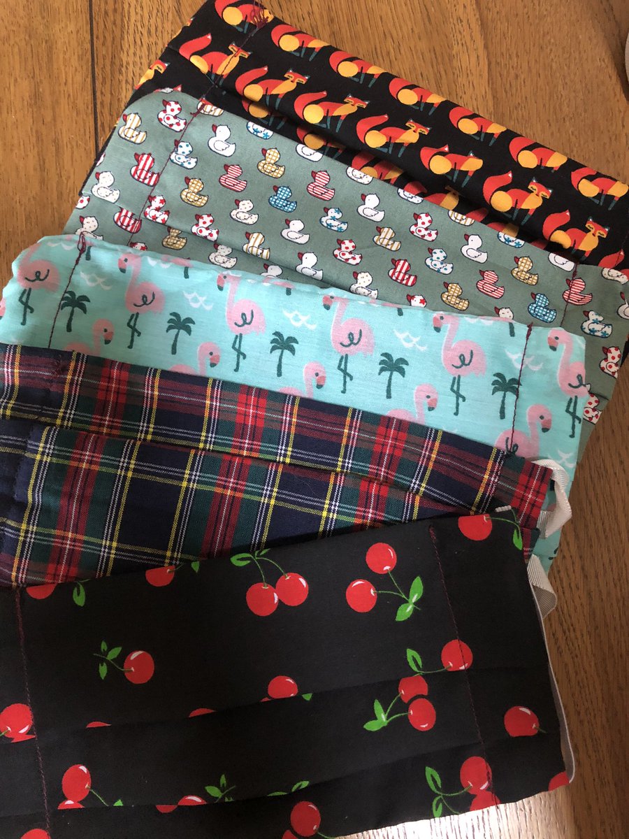 Marie___Stewart's tweet photo. Rainy Sunday spent sewing masks with my little helper #whybeboring #colourful @bigcommunitysew https://t.co/XyKsrGiiKm