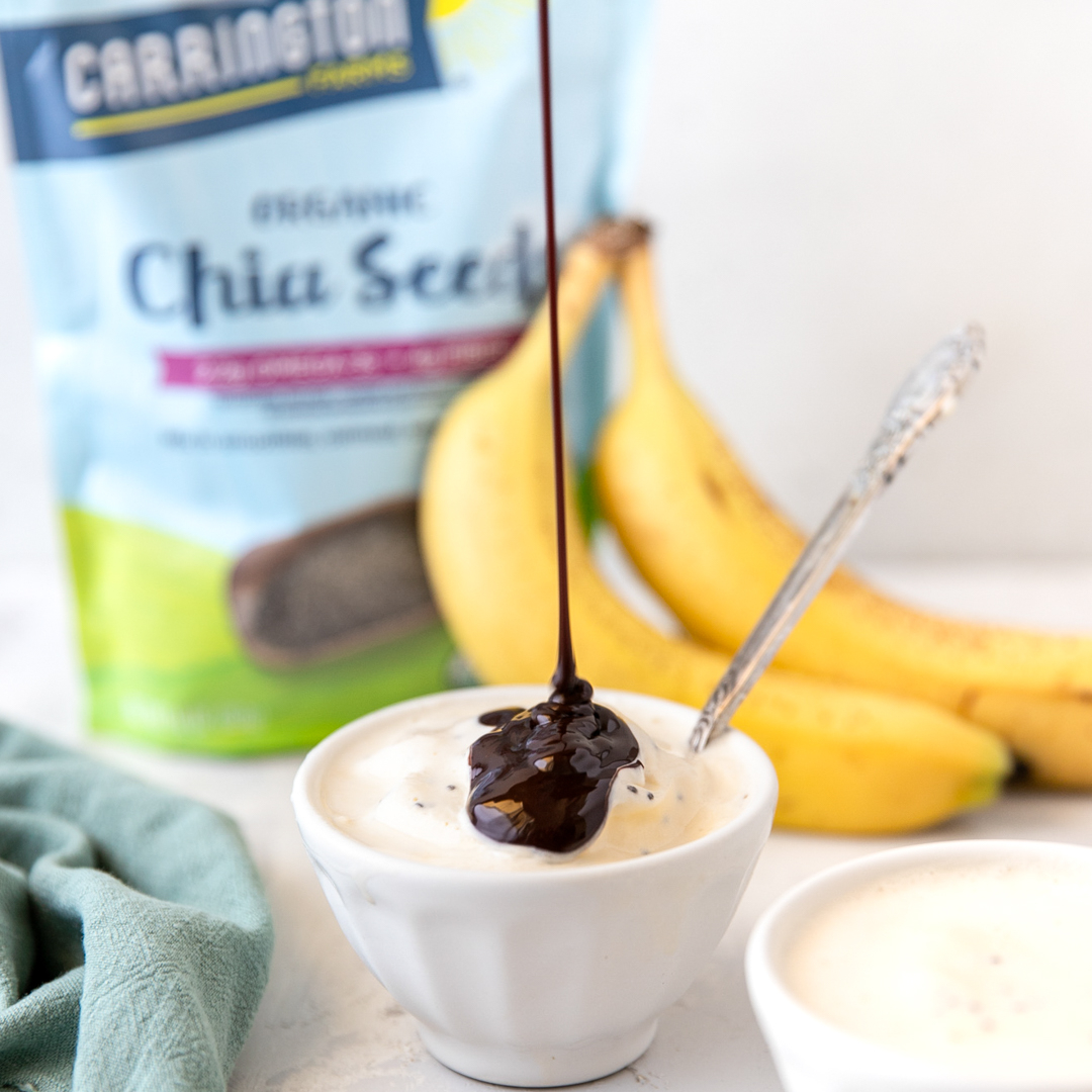 CarringtonFarms's tweet photo. We’re getting creative on National Ice Cream Day! Try our Sneaky Soft Serve Chia Banana Ice Cream, for a creamy, dairy-free alternative to your typical scoop 🍨. Just blend, pour, and drizzle with chocolate 🍫 #CookWithCarrington #NationalIceCreamDay https://t.co/GcEBb6JL05