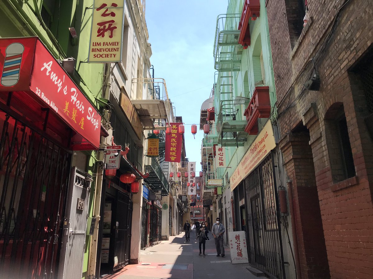 LeeHepner's tweet photo. Beautiful Ross Alley and almost forgot I snapped this pic of my rockstar colleague @Sarah24usa taking a “break” from our day off to tell @SFDemocrats the importance of allowing non-citizens to serve on City Commissions - coming to a ballot near you this Fall! #CommissionsForAll https://t.co/PJfj3WltRl