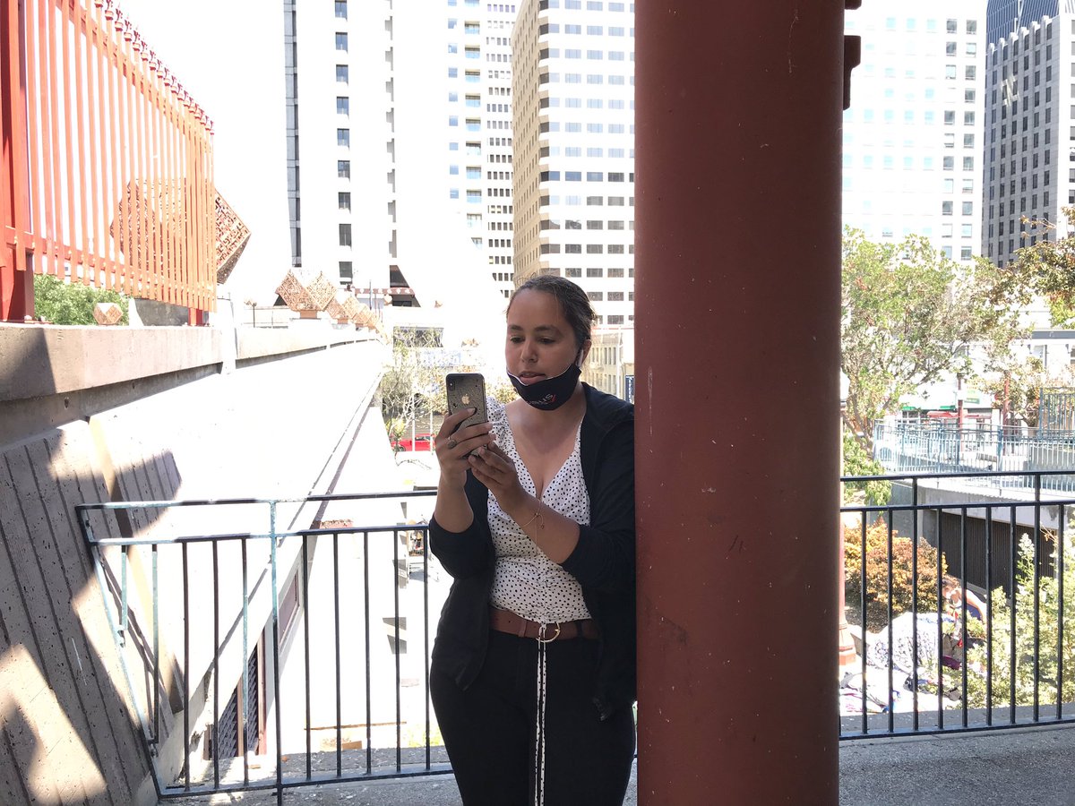 LeeHepner's tweet photo. Beautiful Ross Alley and almost forgot I snapped this pic of my rockstar colleague @Sarah24usa taking a “break” from our day off to tell @SFDemocrats the importance of allowing non-citizens to serve on City Commissions - coming to a ballot near you this Fall! #CommissionsForAll https://t.co/PJfj3WltRl