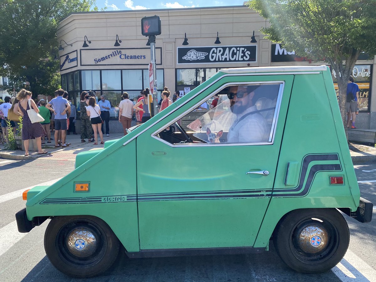 somerville_ev's tweet photo. Our #ComutaCar Bertha is electric AND green! So it’s no surprise she supports the Green New Deal. She got to catch Senator Ed Markey @edmarkey serving up the #GreenNewDealWithIt ice-cream flavor at our favorite local ice-cream shop @icecreamgracies on this beautiful summer day! https://t.co/dXyPd813kJ