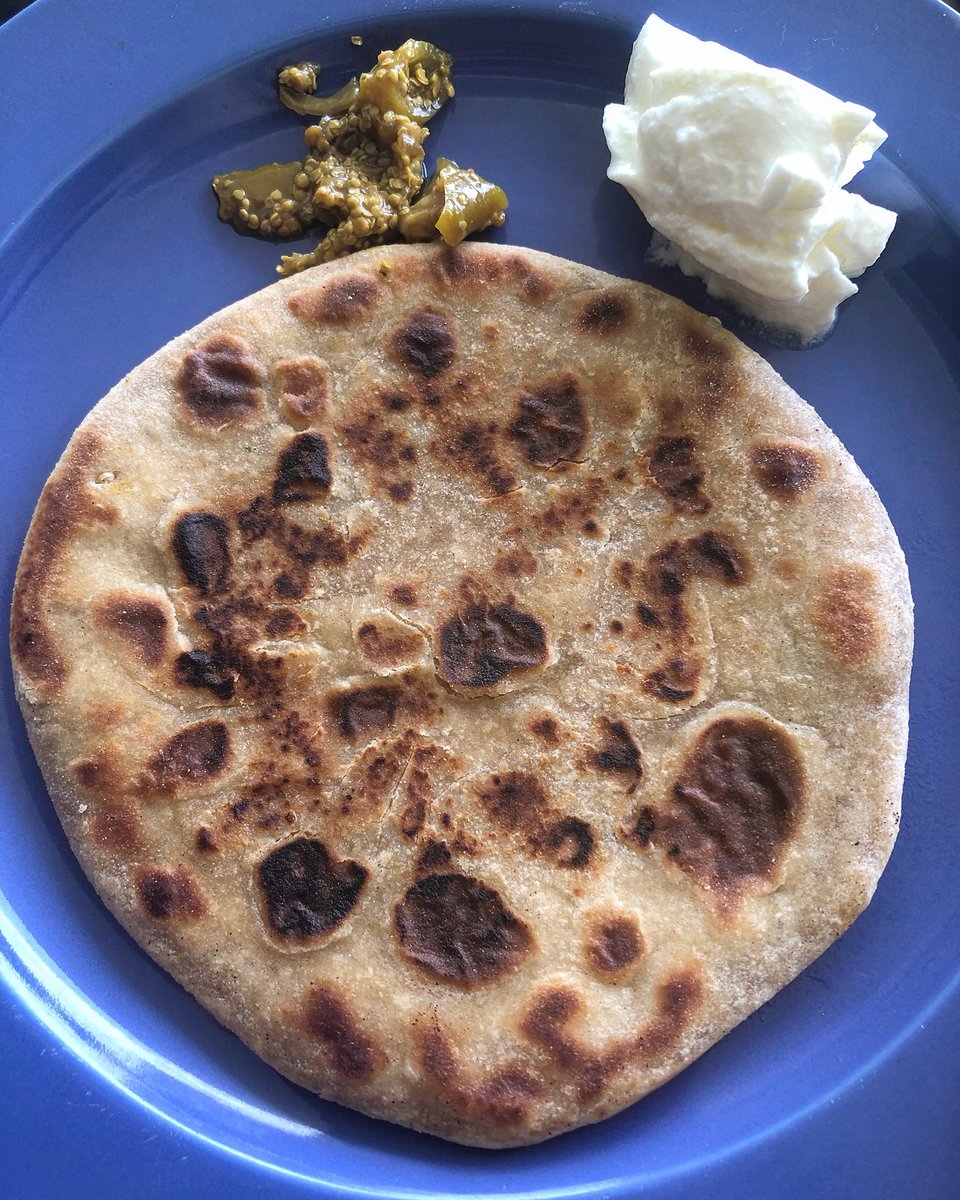 SicilyChechi's tweet photo. My kinda food porn. Straight out of a frozen packet and on to the tawa. Tastes nice actually! 

PS: You send me the cheque later, Vadilal. I’m not an influencer. YET. https://t.co/2L9drbNNEG