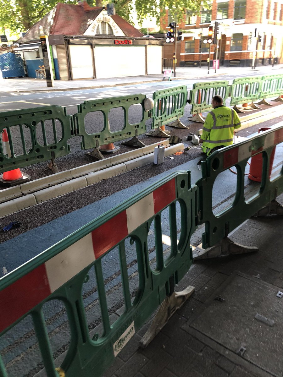 This is nowhere near finished, so don’t come down to ride it – but workers are installing proper segregation on CS7 near Southwark Bridge - there are some sections of wands but these are full cast concrete kerbs