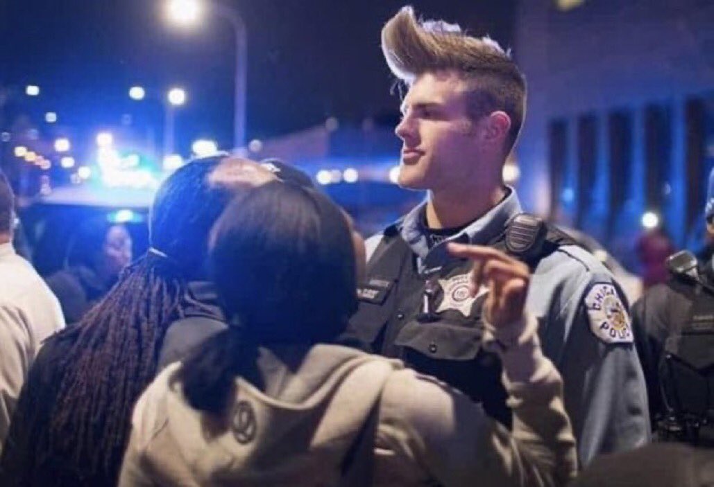 ChaseMit's tweet image. This cop looks like a videogame protagonist from 2002