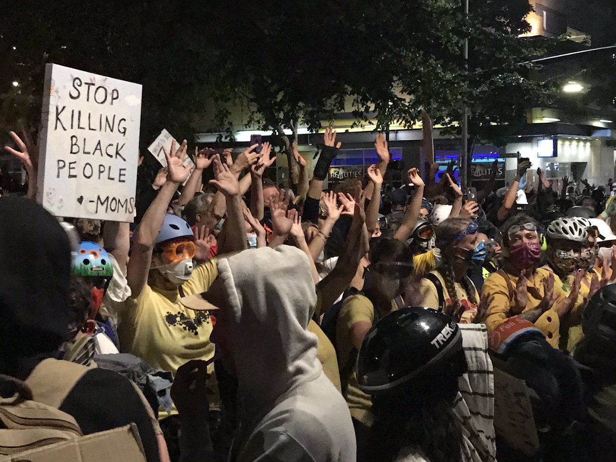 Crowd: #HandsUpDontShoot!